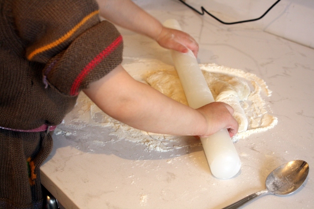 After the dough has come to room temperature, roll it out 